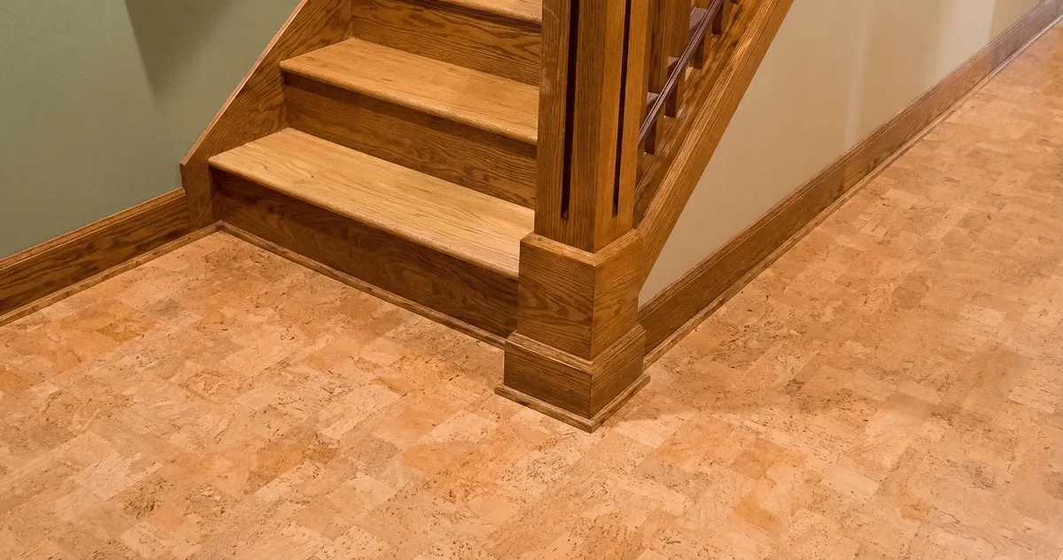 End of a staircase with cork flooring in Detroit, MI