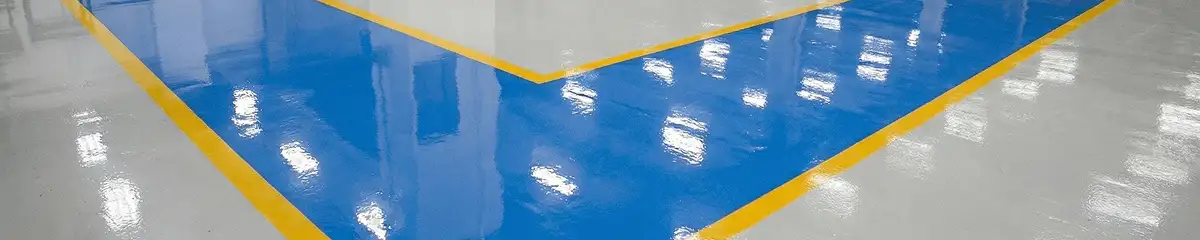 A factory floor professionally covered and marked with epoxy flooring in Detroit, MI