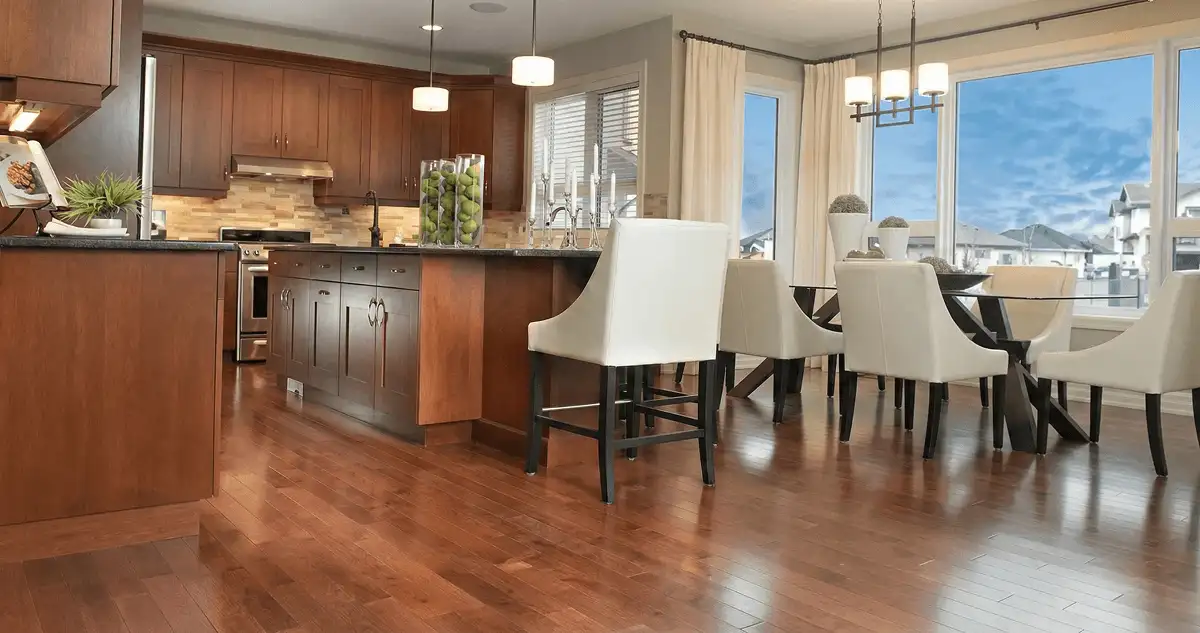 A modern kitchen with professionally installed wood flooring in Detroit, MI