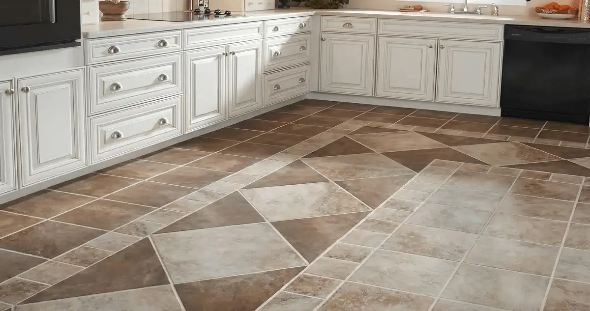 Kitchen with white cabinets and a professionally installed tile floor in Detroit, MI